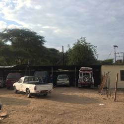 Repair shop! More dead cars than live ones!