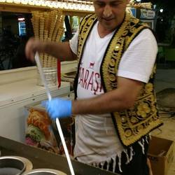 The tough ice cream mass is kneated thoroughly with a huge spatula!