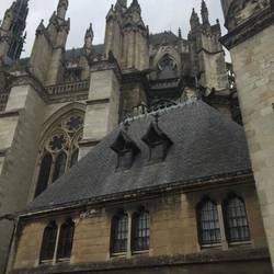 little house of god squashed next to the big one