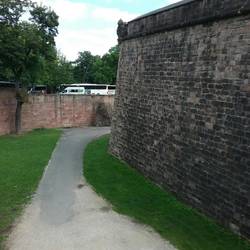 Dry moat. Had arrow places at bottom to shoot the enemy