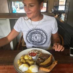 Myself looking super happy with my food (ps that is a mosquito bite on my face)