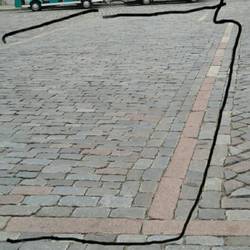 The red brick line is a memorial to the house that used to be here