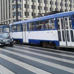 Trolley bus. All the Baltics use them. Uses overhead electrics like a tram