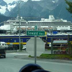 The Wilderness Express (blue and yellow) in the Depot; and the Zaandam at the dock.
