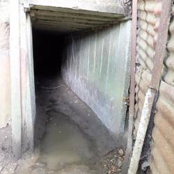 Wet, cold, dark, cramped and muddy - not a good combination