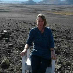 On the throne in the "desert" with glacier in background