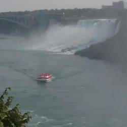 Boats go close to the falls