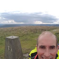 Twmbarlan trig point. Cardiff in background