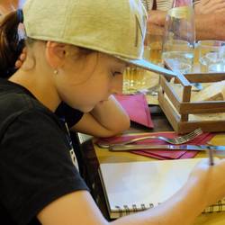 Katiekoozle sketching the restaurant window