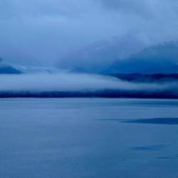 A glacier enshrouded in mist