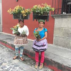 Ladies in the street selling flowers