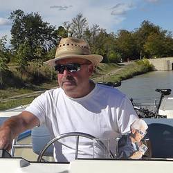 Flat Mary helps Jiggs steer down the canal