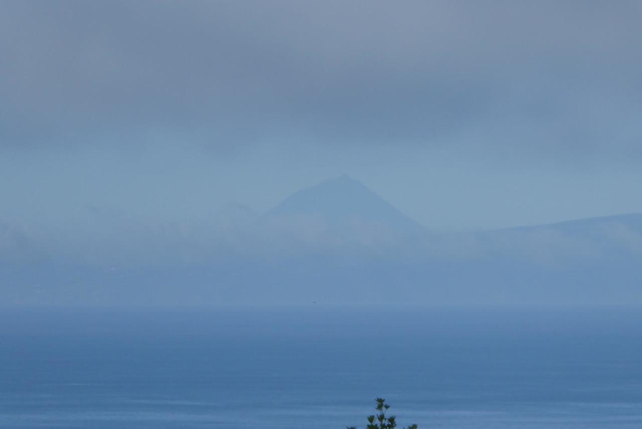 View of Sao Jorge from Terceira, with the volcano of Pico behind