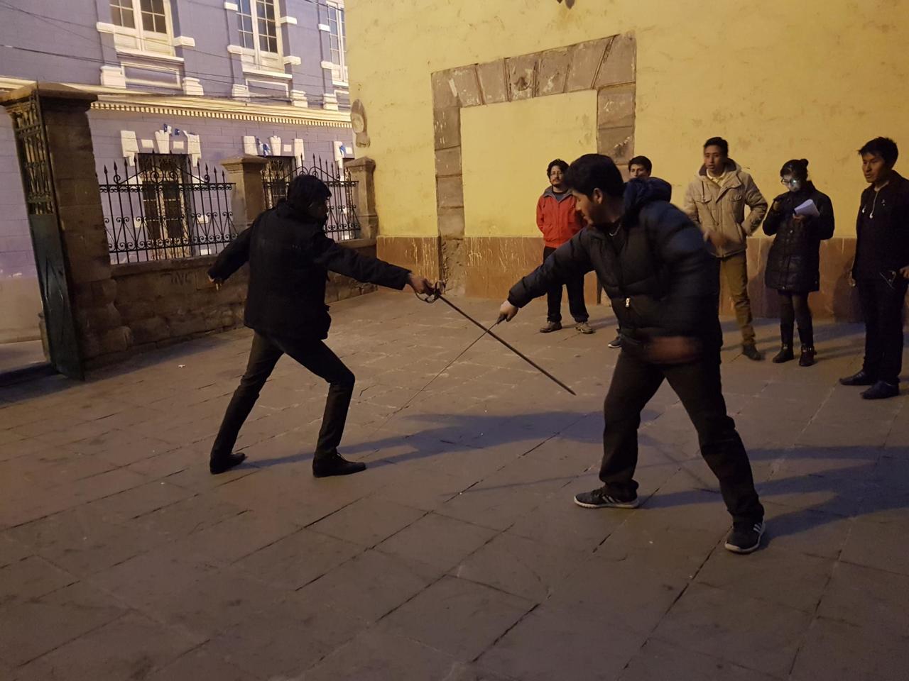 Teaching sword fighting at the base of Tower of Jesus