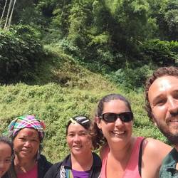 With the Black Hmong people. Our guide in the middle. Two villagers on left that trekked with us.