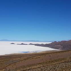 Salt plains spread till where the eyes can see