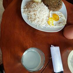 Vegetarian option with egg, lentil patty, rice and potatoes