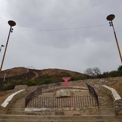At the base of the hill