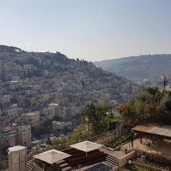 Walking through the excavated remains of David's City to the entrance of Hezekiah's Tunnel
