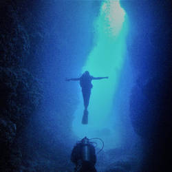 Brian doing the crucifix pose, Ed underneath looking like he's praying