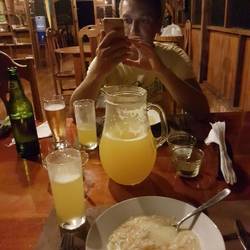 Maracuya juice and carrot soup with cheese