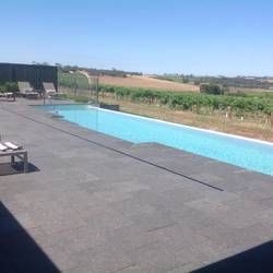 The infinity pool overlooking the vineyards