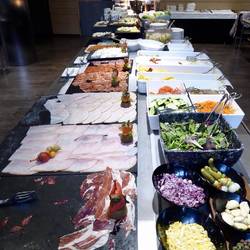 Meats, cheeses, fruits, yogourt, vegetables, hot entrees, etc.