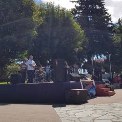 A church choir sings in the main square