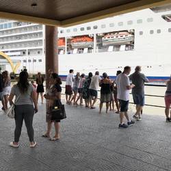 Locals taking photos of our ship.