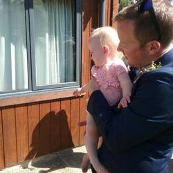 Daddy and Kenzie. She is not happy with all these people!