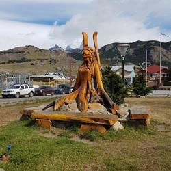 Wooden bench in the shape of a skier