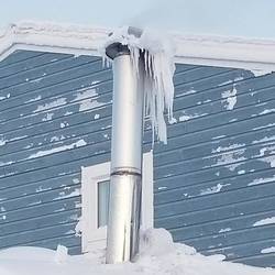 It's so cold the chimneys have icicles
