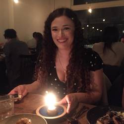 Maya with her birthday cupcake. (No singing was permitted)