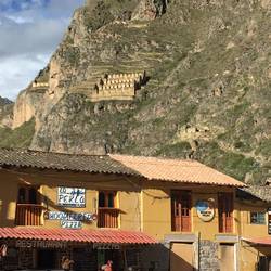 Ollantaytambo - View of Incan store houses behind