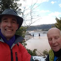 Very high cliffs above the Wye. This view lookng north up River Wye to Chepstow old Bridge.