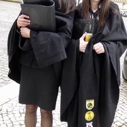 Black cape uniform originated with capes worn by Jesuits and clergy