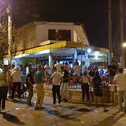 Restaurant and street shops hosting street dance party