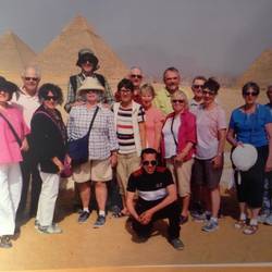 Group photo at the Giza Plateau with Mostafa our fearless guide in front