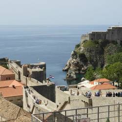 Notice all the people walking around the walls