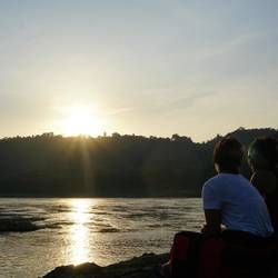 Jasette et couché de soleil sur le Mékong.