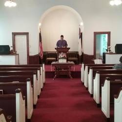The guy at the pulpit is Mr. Burchwell!