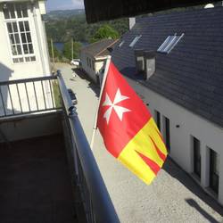 Different from the Spanish National flag...the provincial flag of Galacia I think.