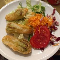 Fried zucchini flowers. One of several courses at dinner.