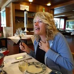 Colleen at our table tonight having a lively conversation.