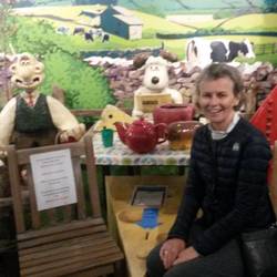 Lou having tea with Wallace and Grommit