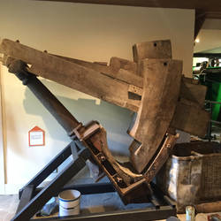 Fulling machine pounds the wet cloth under the hammers