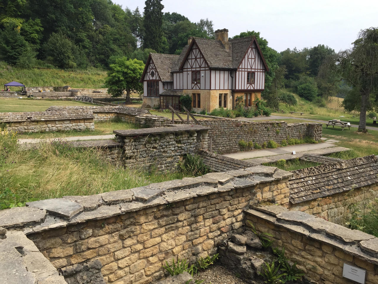 Roman walls, covered by local stone in Victorian times, to protect them