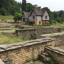 Roman walls, covered by local stone in Victorian times, to protect them