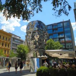 twisting and reflective sculpture depicts the head of writer Franz Kafka (link in "comment")