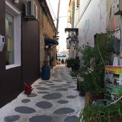 Take Five viewed down an alley in Koroni